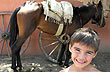 Happy after the horseback ride - Photo: Pablo Etchevers
