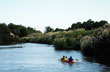 Rowing across the creek - Photo: Cristina Sabaliauskas - Welcomeargentina.com