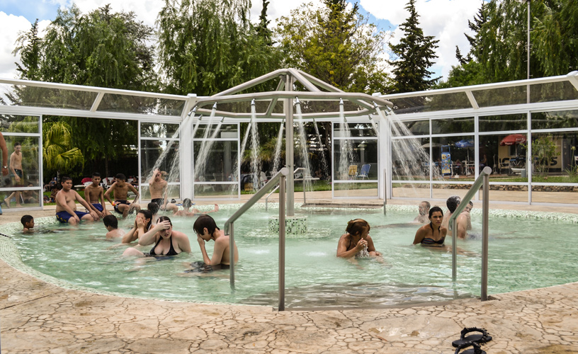 Pools with pressurized water spurts and showers