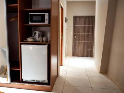 Departamentos Leloir Suites