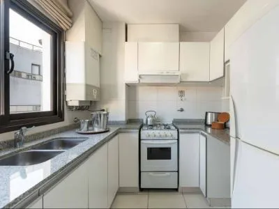 Departamentos AT Suites